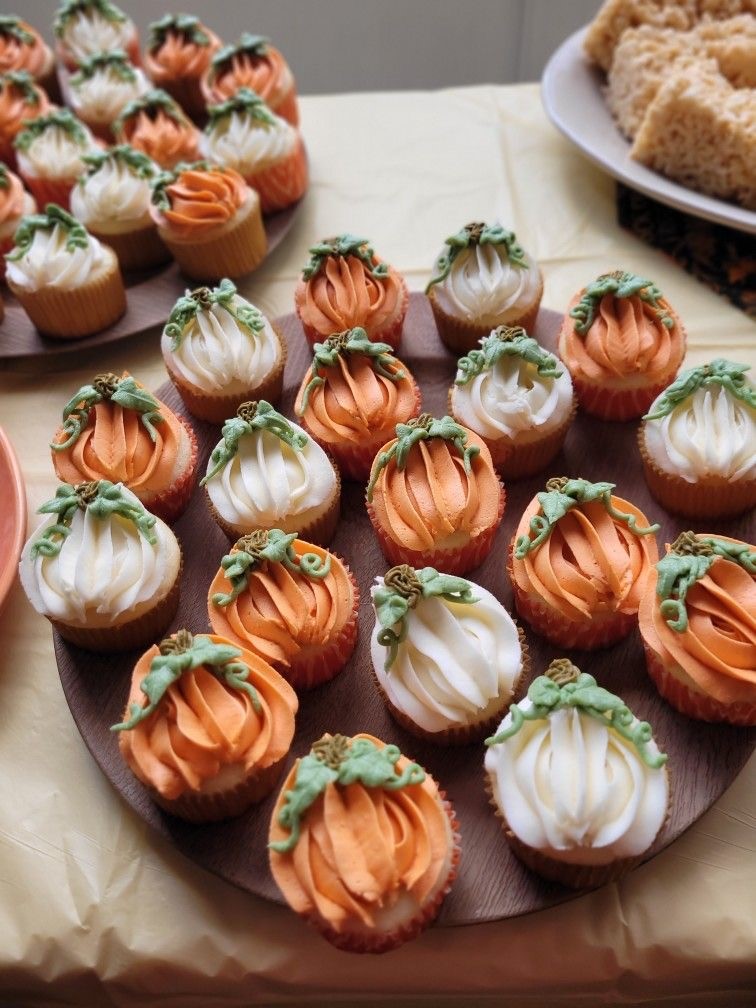 photo of cupcakes decorated with pumpkins