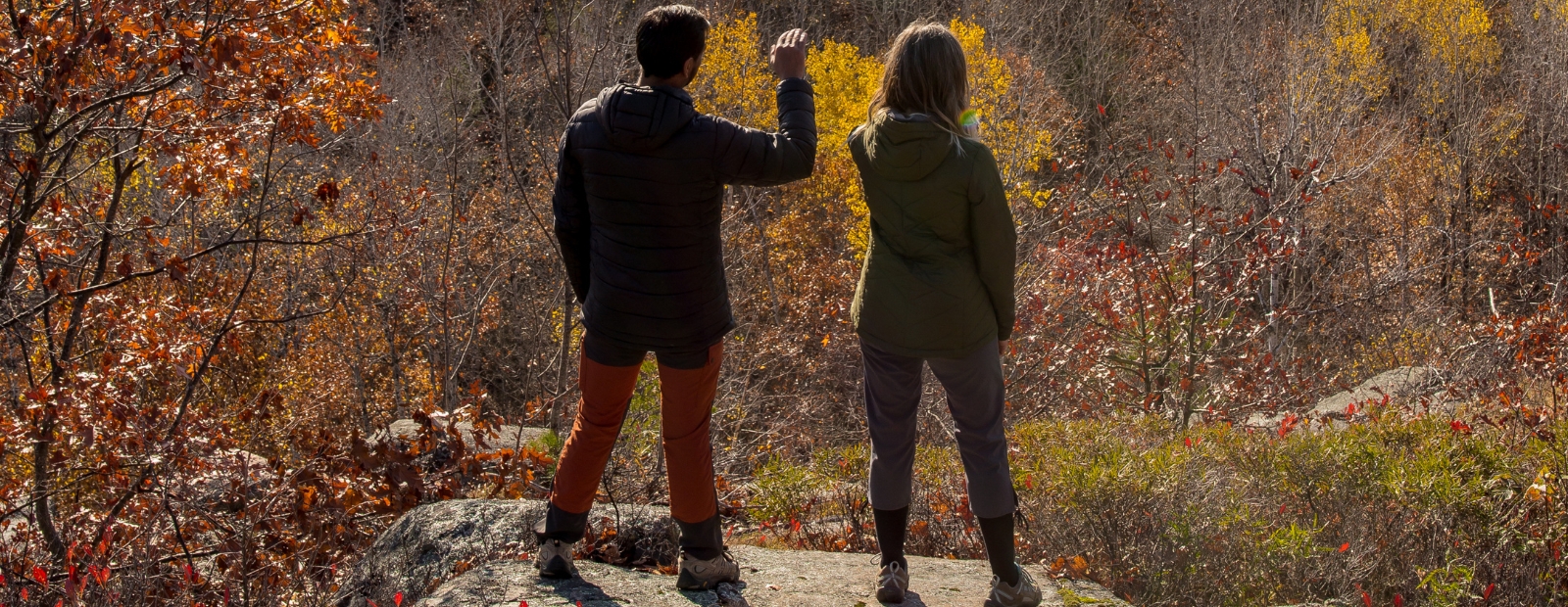 Two people hiking in autumn.