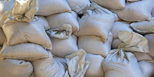 Piled sand bags.