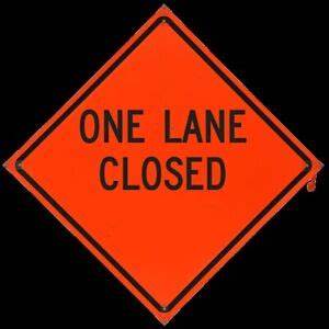sign stating one lane closed