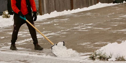 A person shoveling snow.