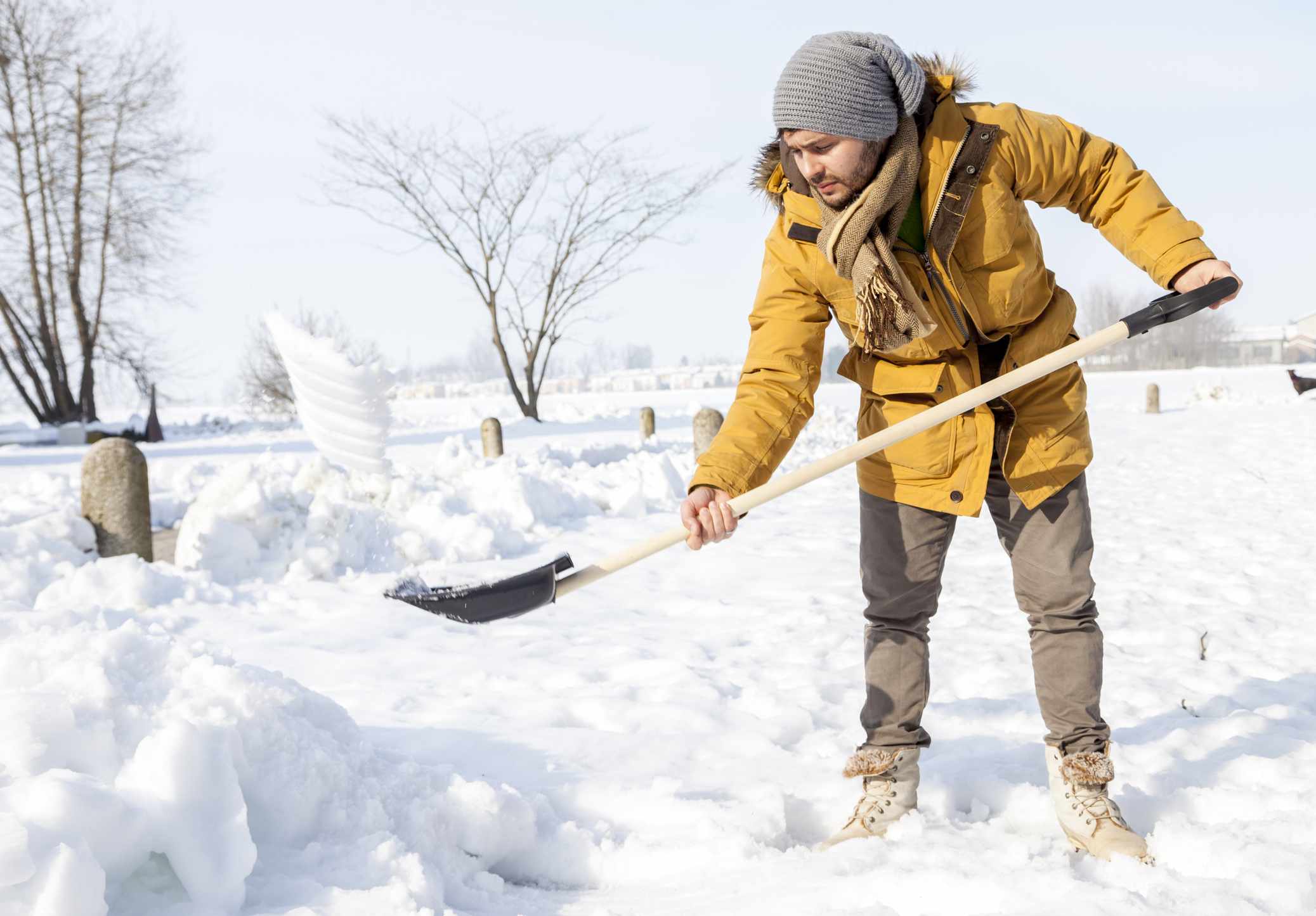 man shovelling snow