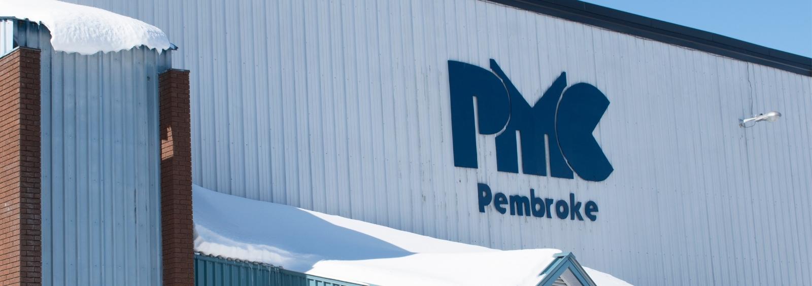 Sign saying PMC Pembroke. Pembroke Memorial Centre.
