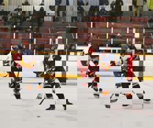 Terry O'Neill Regional Silver Stick Hockey Tournament Two hockey players battle for a puck.