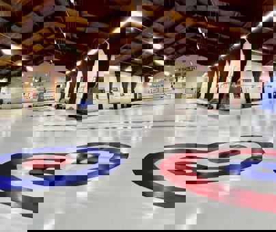 Pembroke Curling Centre The inside of a curling rink.